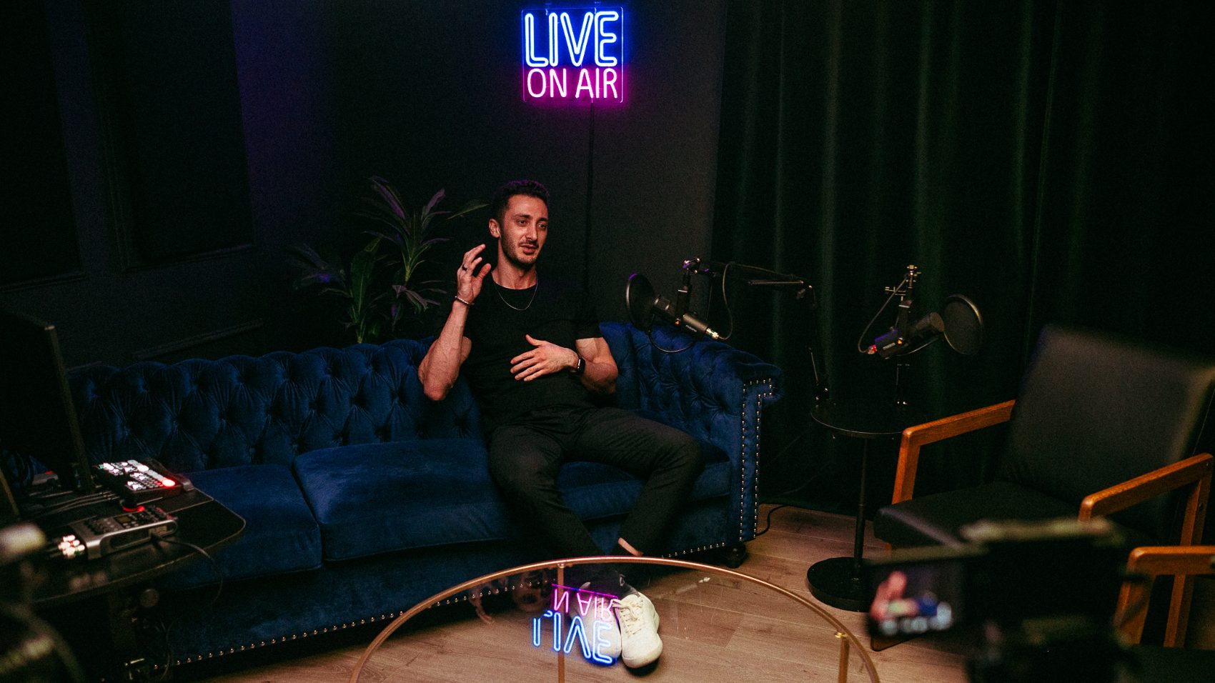 Arya building on camera in the studio